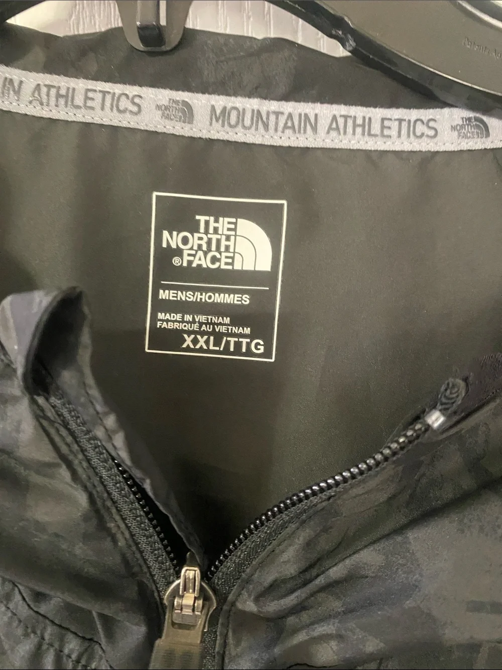 The North Face Men’s Black Camouflage Hooded Windbreaker